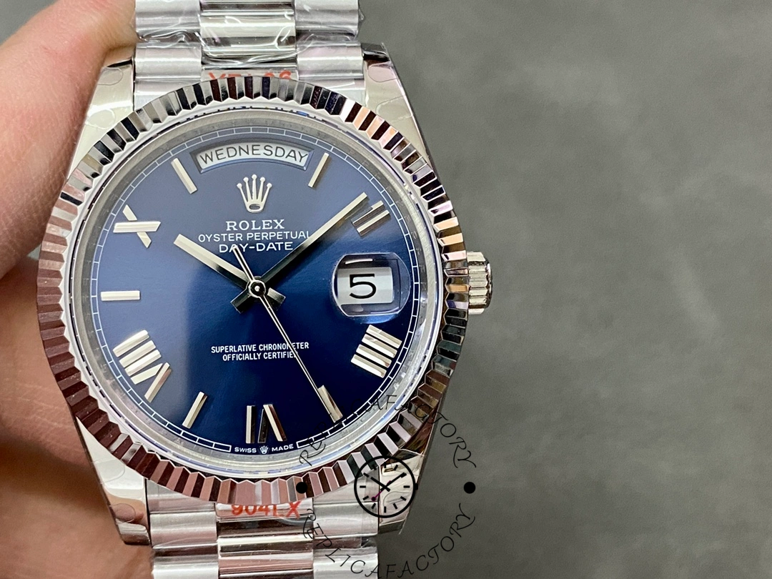 Replica Rolex Day-Date 228239 Blue Roman Dial Fluted Bezel 40mm Mens Watch - QualitySwissReplica