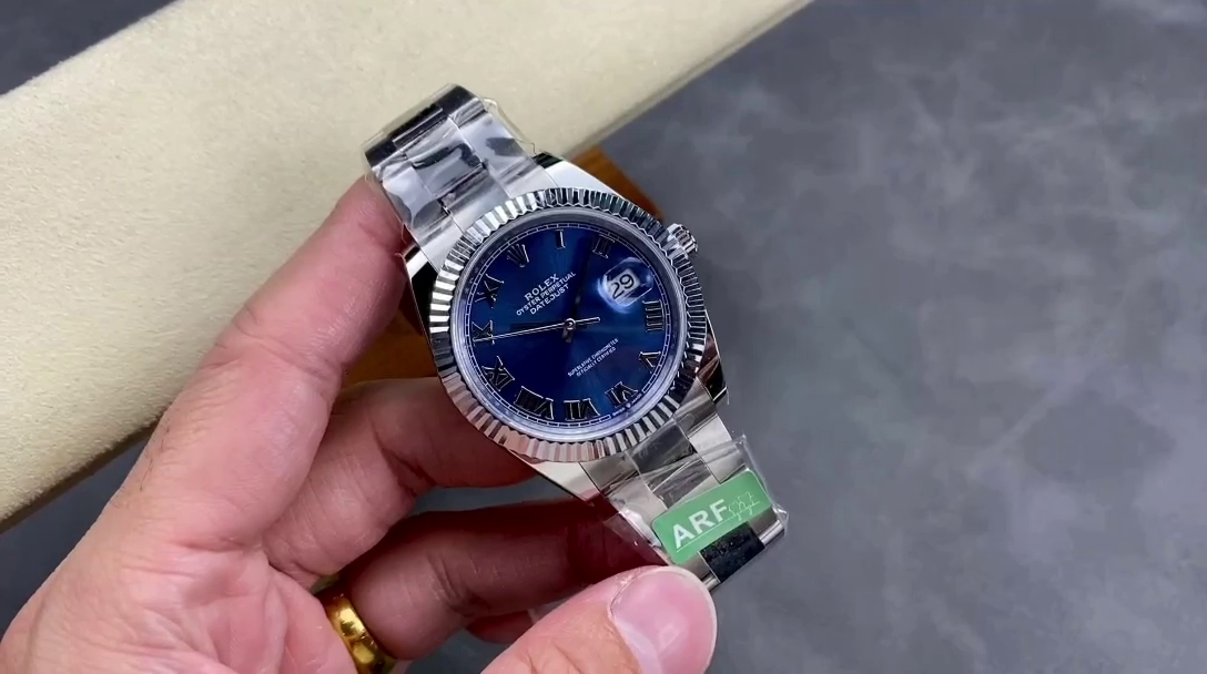 Replica Rolex Datejust 126334 0025 Fluted Bezel Blue Roman Numeral Dial 41MM Mens Watch - QualitySwissReplica