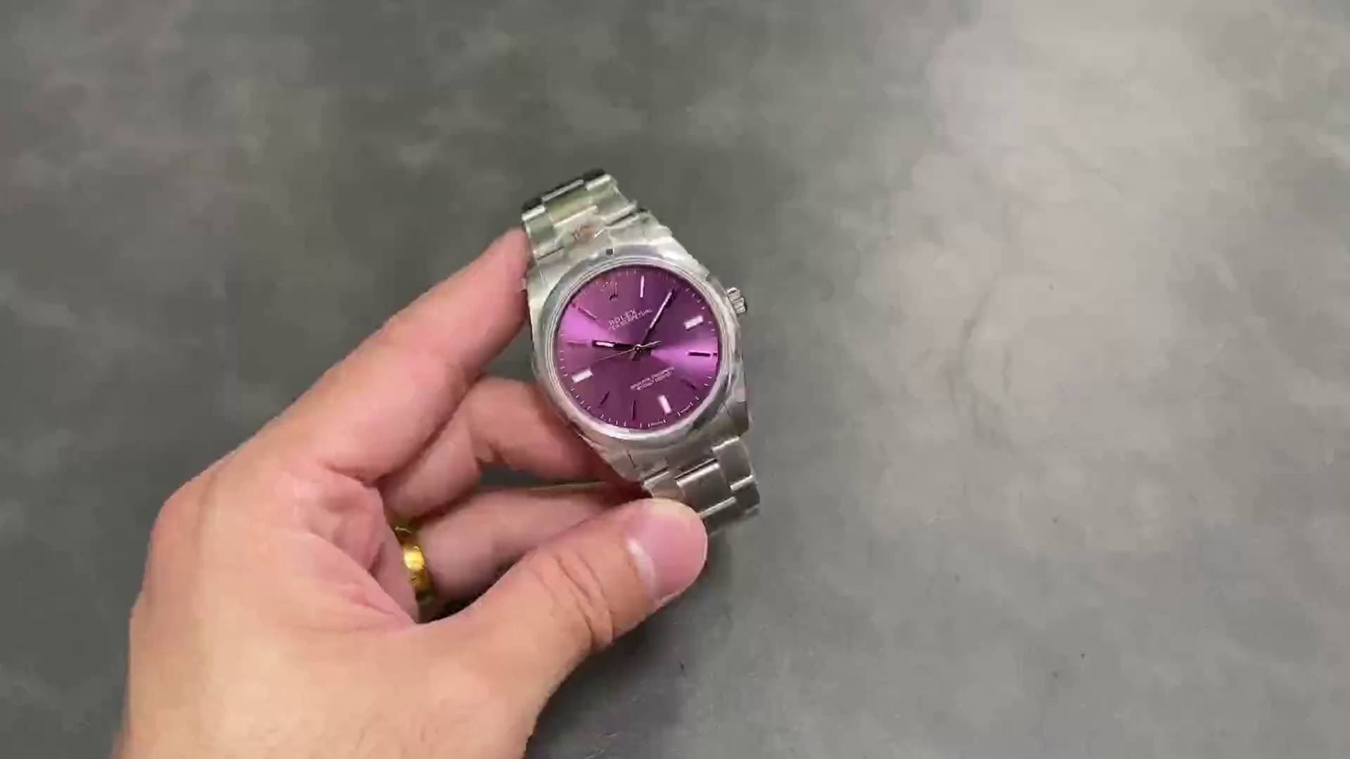 Replica Rolex Oyster Perpetual 39 Red Grape Dial Steel 114300 0002 Men's Watch - QualitySwissReplica