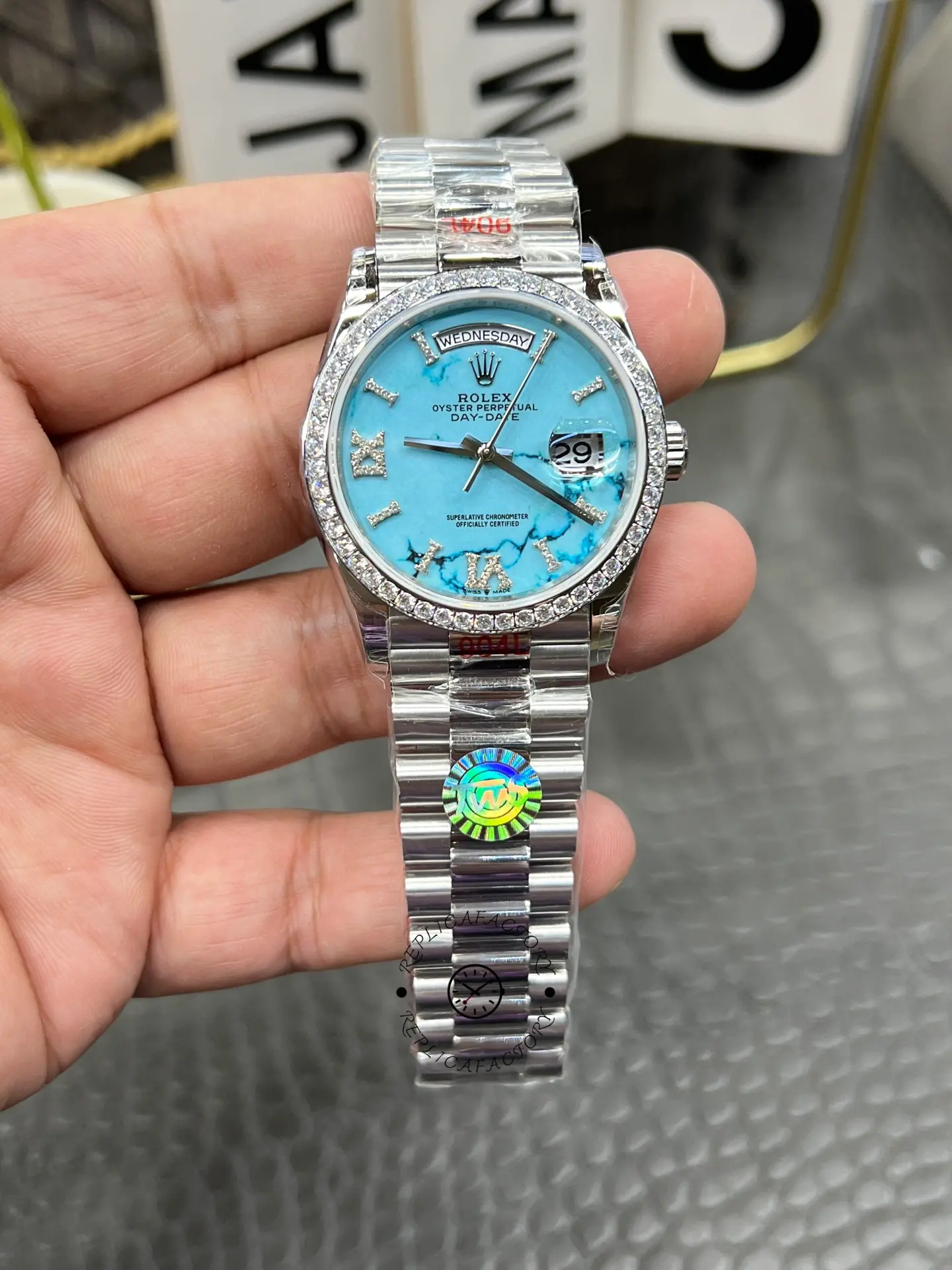 Replica Rolex Day Date 36 Platinum Turquoise Diamond-Set Roman Dial Diamond Bezel m128396tbr 0016 - QualitySwissReplica