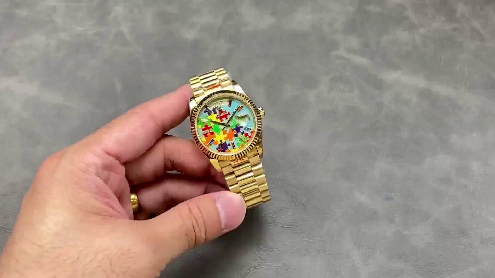 Replica Rolex Day Date 128238-0106 36mm Yellow Gold Fluted Bezel Emoji Puzzle Dial - QualitySwissReplica