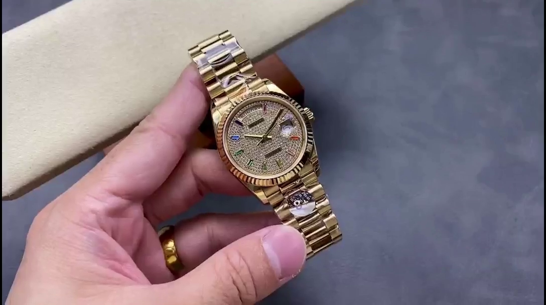 Replica Rolex Day Date 36mm Yellow Gold 128238 0051 Pave Rainbow Diamond Dial Fluted Bezel - QualitySwissReplica