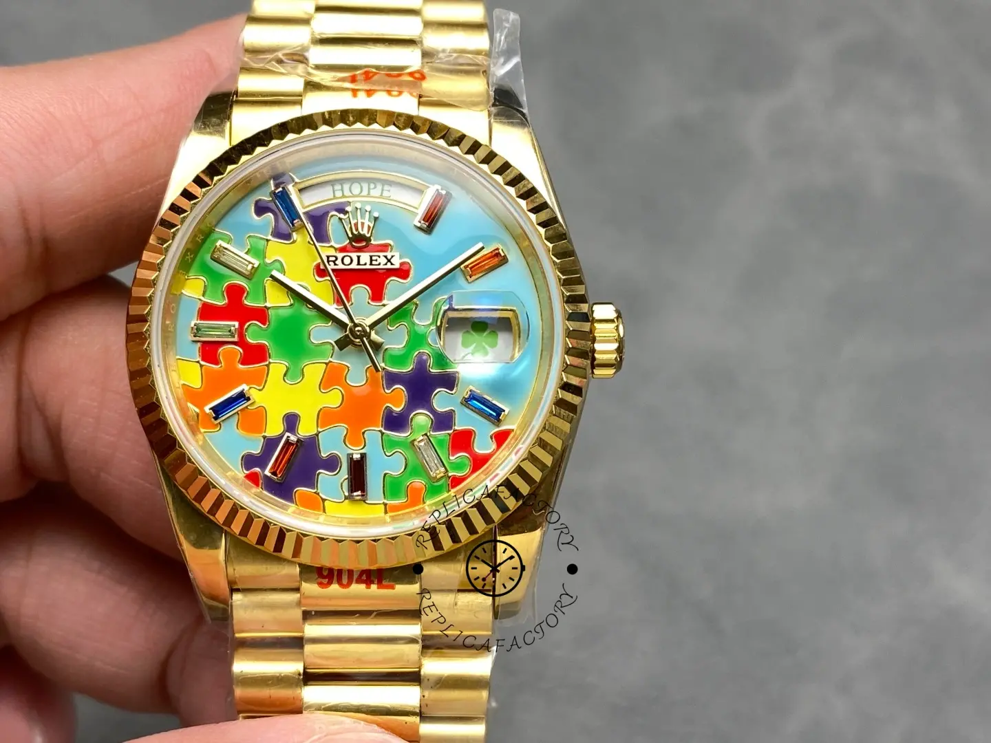 Replica Rolex Day Date 128238-0106 36mm Yellow Gold Fluted Bezel Emoji Puzzle Dial - QualitySwissReplica